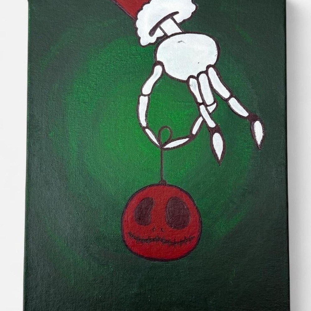 Jack Skellington holding red Christmas ornament smiling face canvas painting